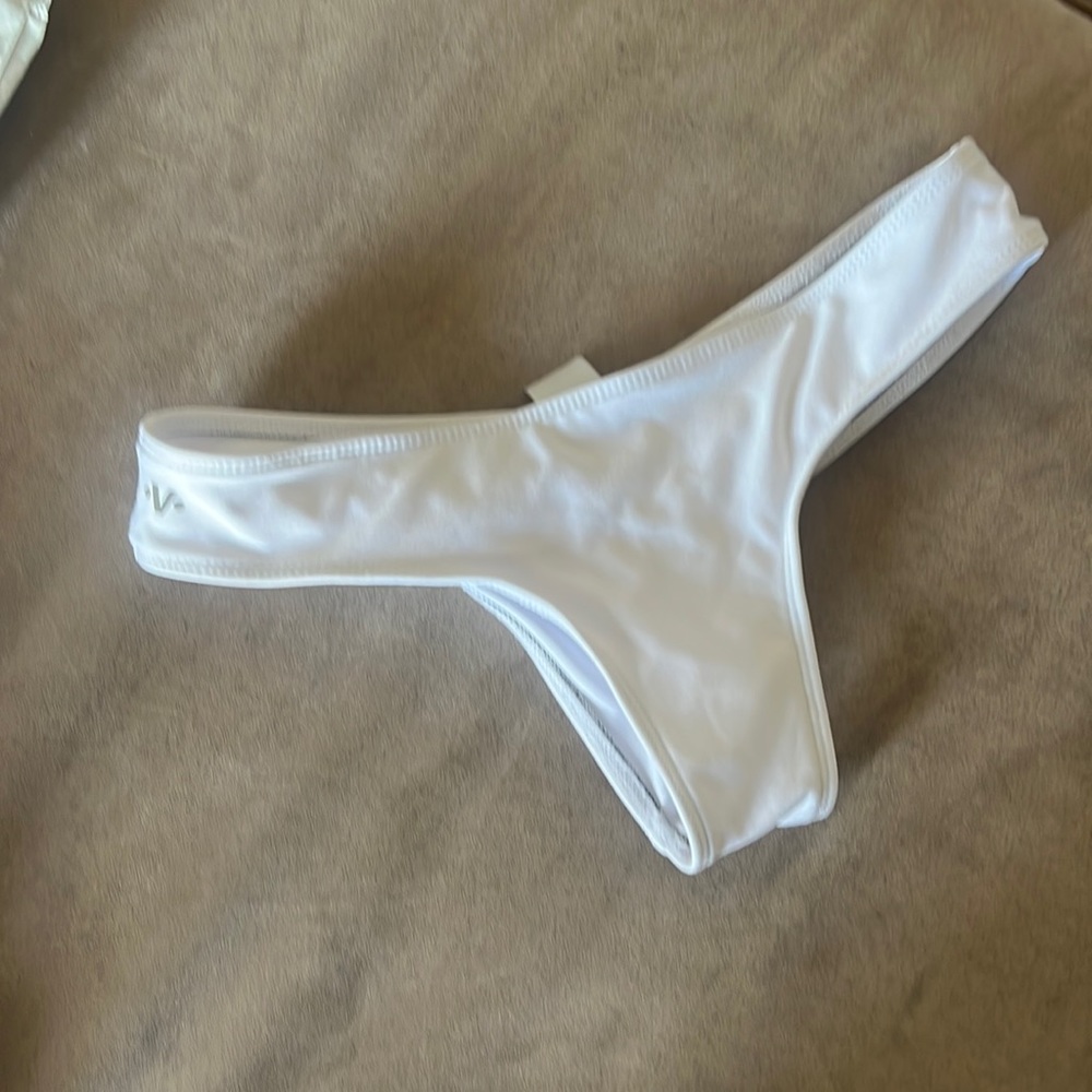 White VEKKER low rise pole shorts. NWOT.